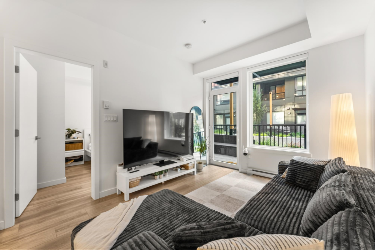 Living Room Photo of 107 13858 108 Avenue, Surrey, BC