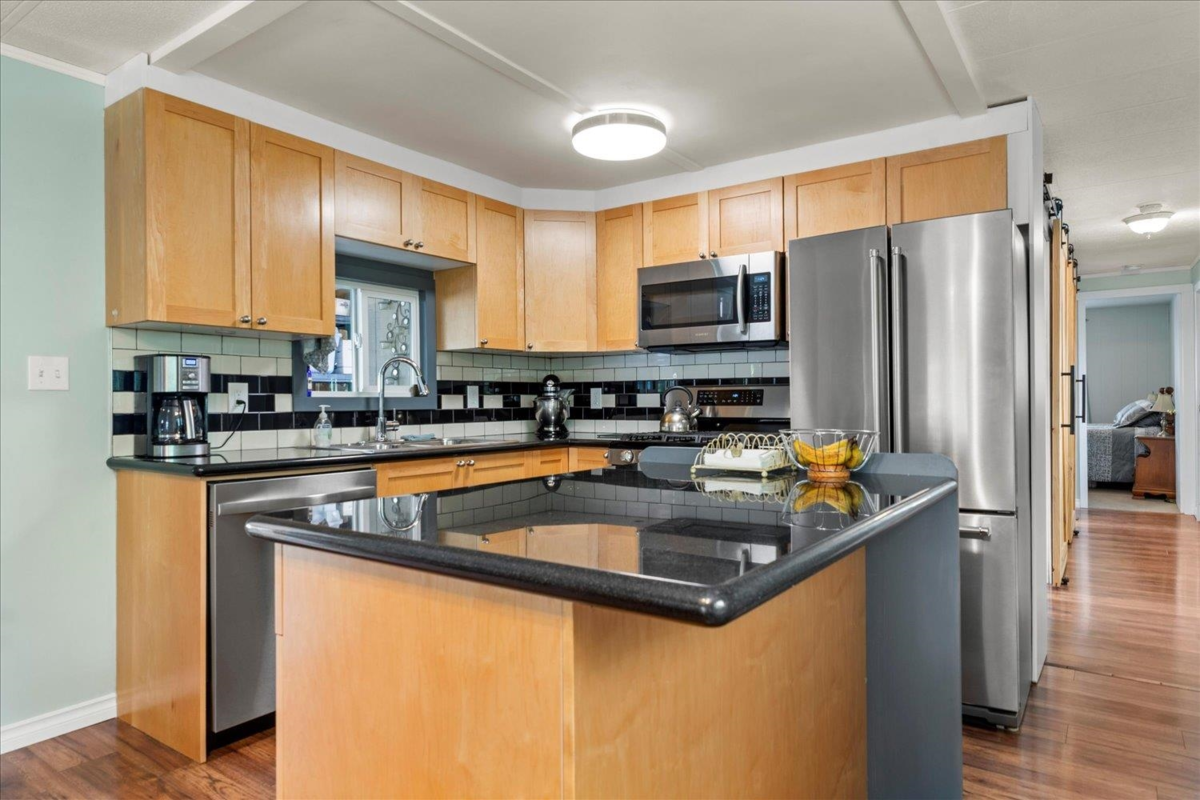 Living Room Photo of 48 45640 Watson Road, Chilliwack, BC