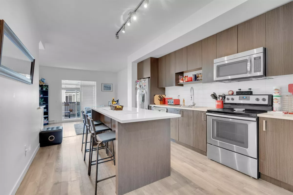 Family Room Photo of 4 13636 81a Avenue, Surrey, BC