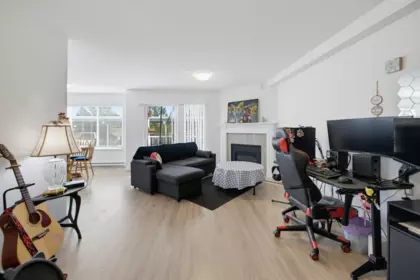 Living Room Photo of 102 7265 Haig Street, Mission, BC