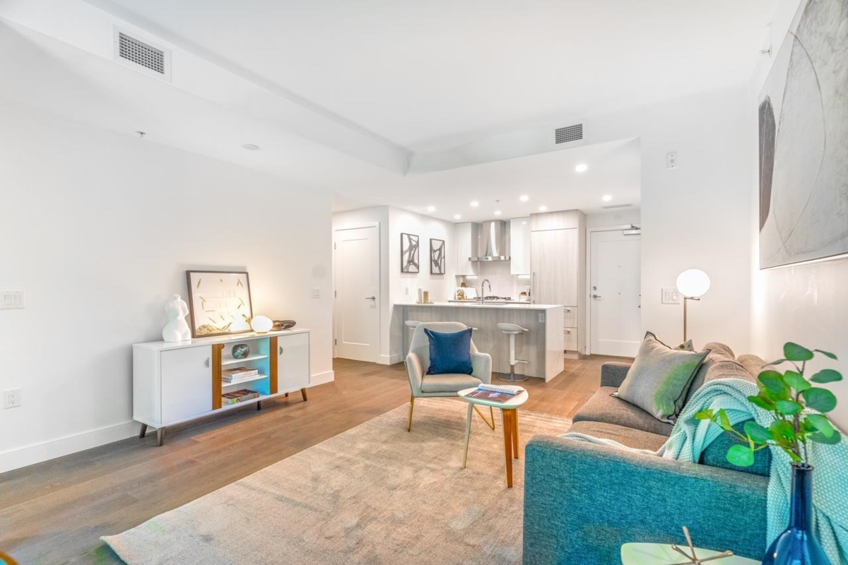 Living Room Photo of 209 488 W 58th Avenue, Vancouver, BC