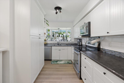 Kitchen Island Photo of 105 2962 Trethewey Street, Abbotsford, BC