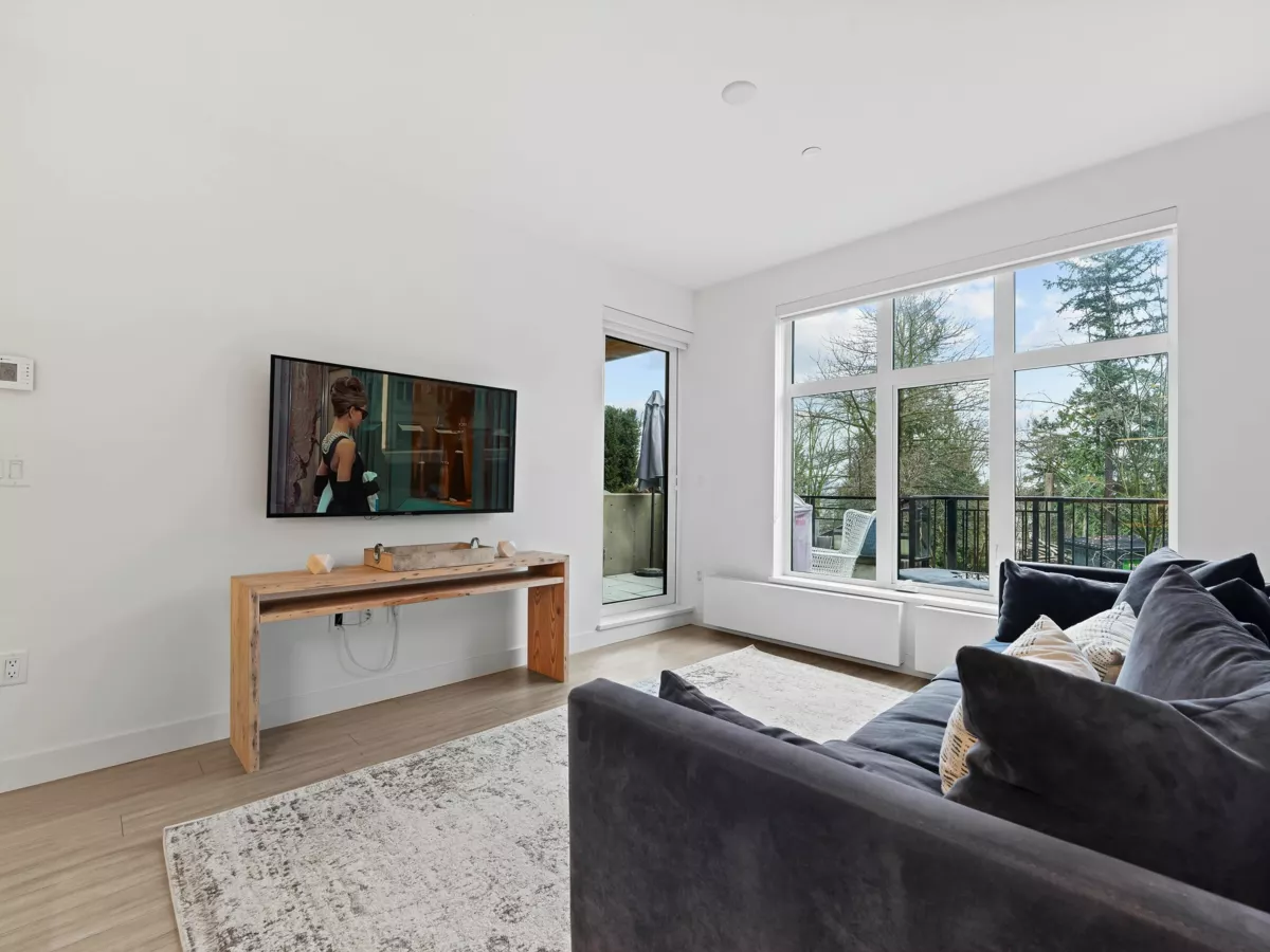 Living Room Photo of 107 733 E 3rd Street, North Vancouver, BC