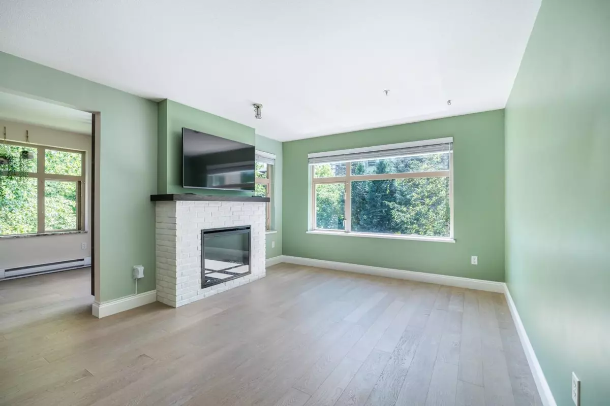 Living Room Photo of 203 400 Klahanie Drive, Port Moody, BC