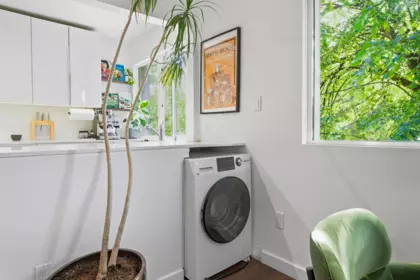 Laundry Room Photo of 201 3465 Glen Drive, Vancouver, BC