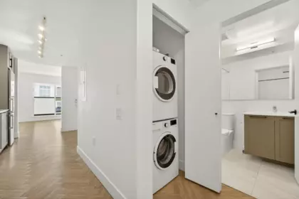Laundry Room Photo of 504 9228 Slopes Mews, Burnaby, BC