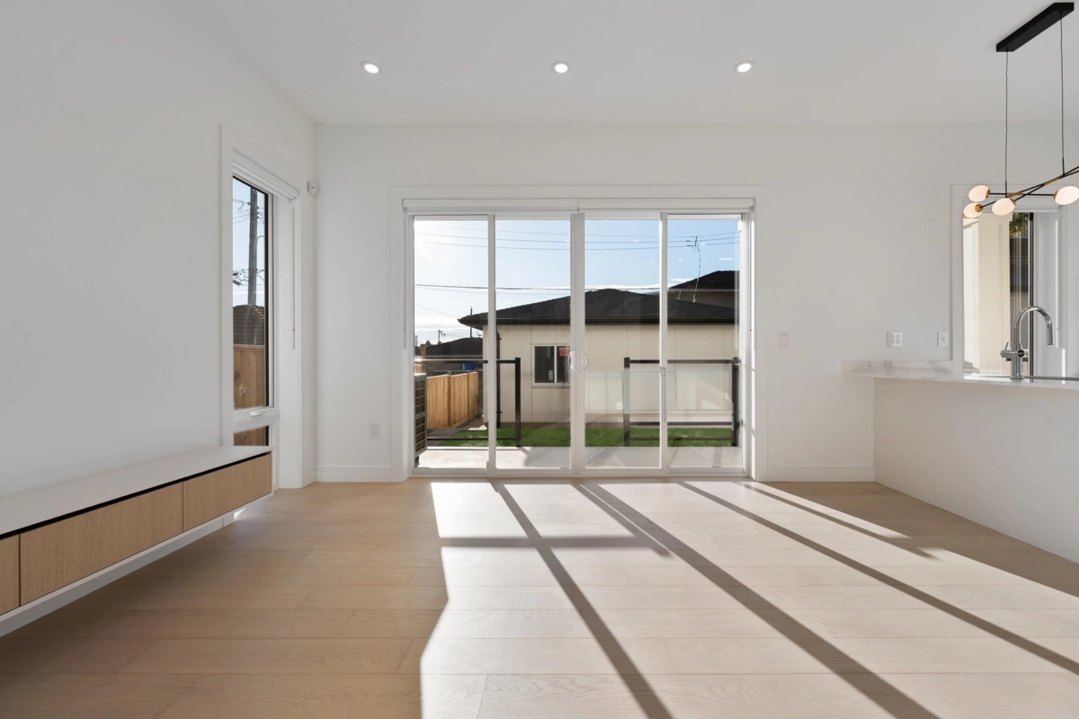 Family Room Photo of 2 6933 Prince Edward Street, Vancouver, BC