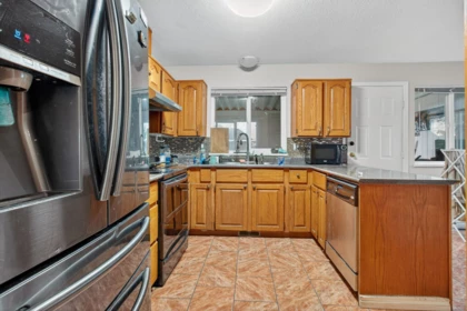 Kitchen Island Photo of 7556 Sinclair Crescent, Surrey, BC