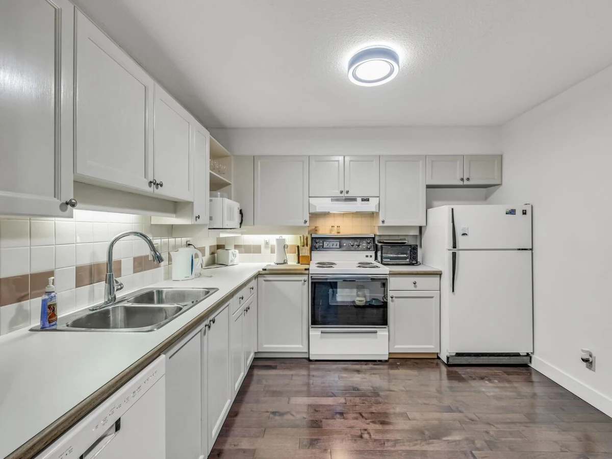 Kitchen Island Photo of 204 6735 Station Hill Court, Burnaby, BC