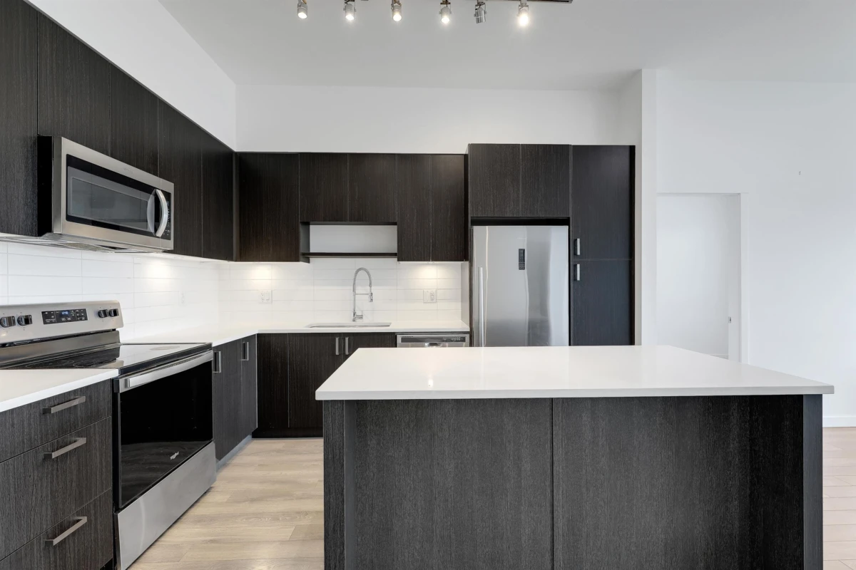 Family Room Photo of 408 13628 81a Avenue, Surrey, BC