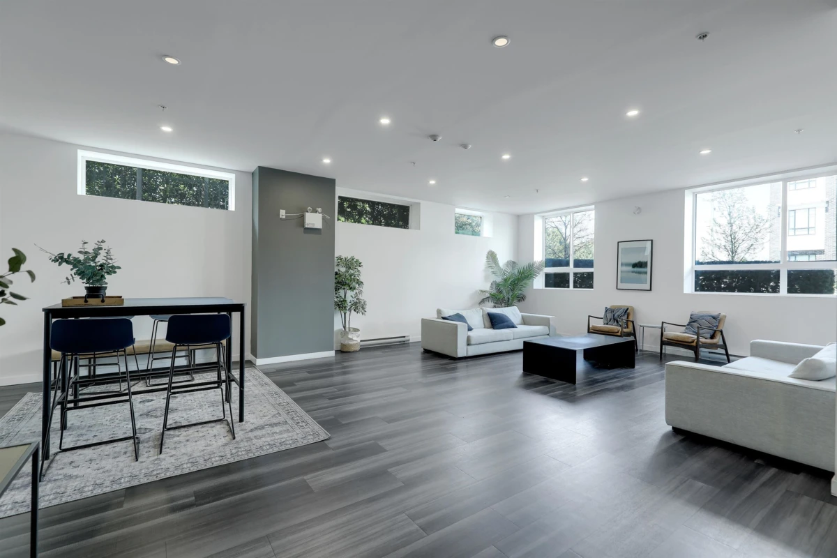 Living Room Photo of 408 13628 81a Avenue, Surrey, BC