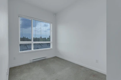 Laundry Room Photo of 408 13628 81a Avenue, Surrey, BC