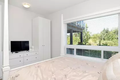 Basement Recreation Room Photo of 1 5778 Marine Way, Sechelt, BC