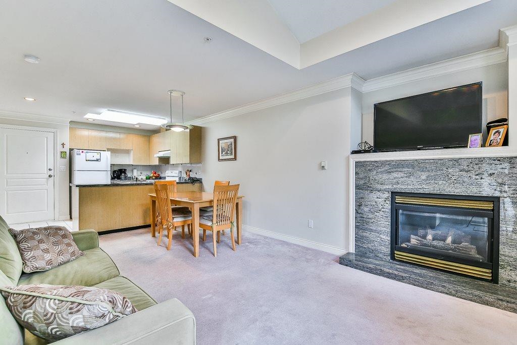 Living Room Photo of 404 8115 121a Street, Surrey, BC