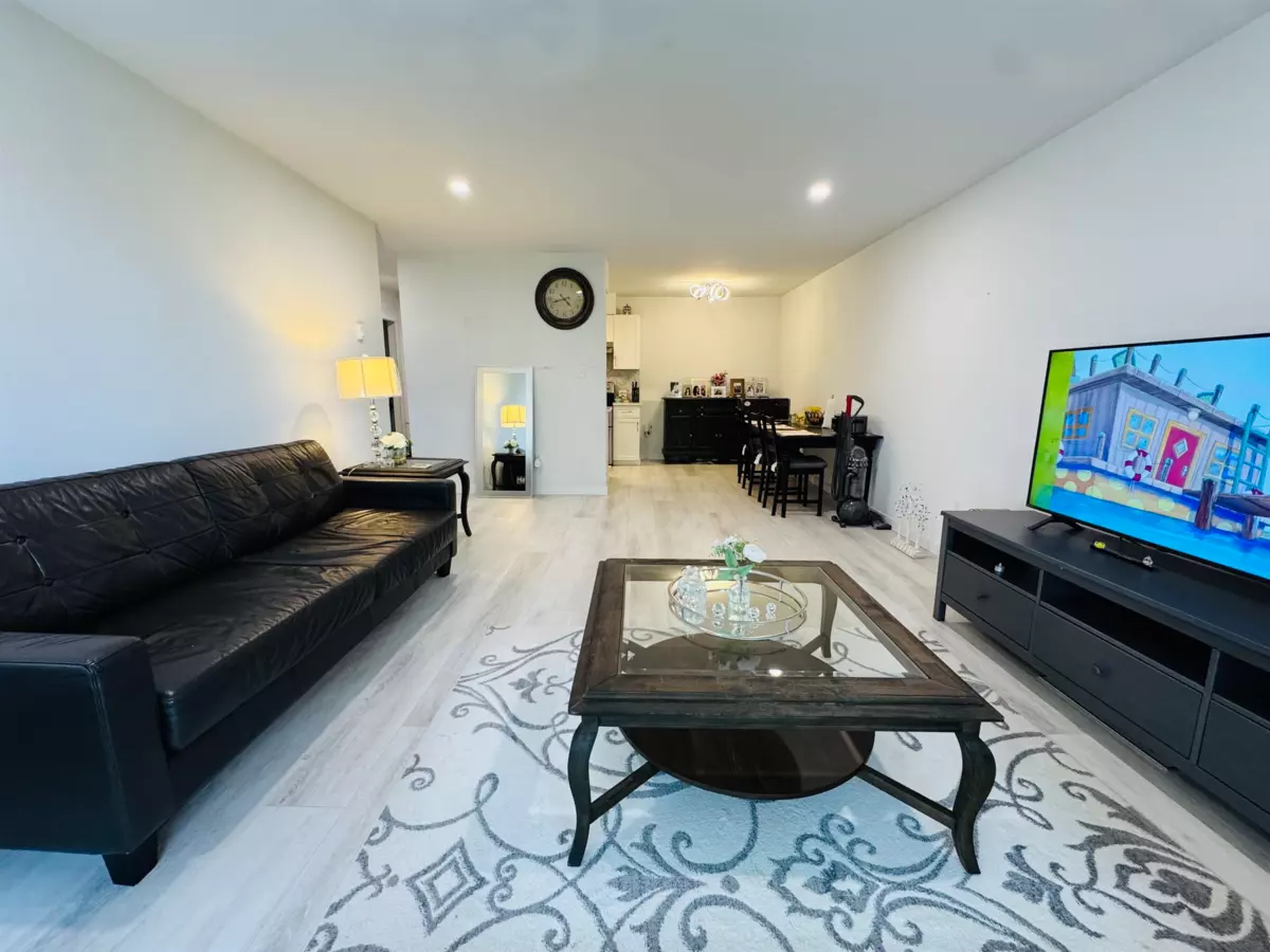 Living Room Photo of 307 15268 100 Avenue, Surrey, BC