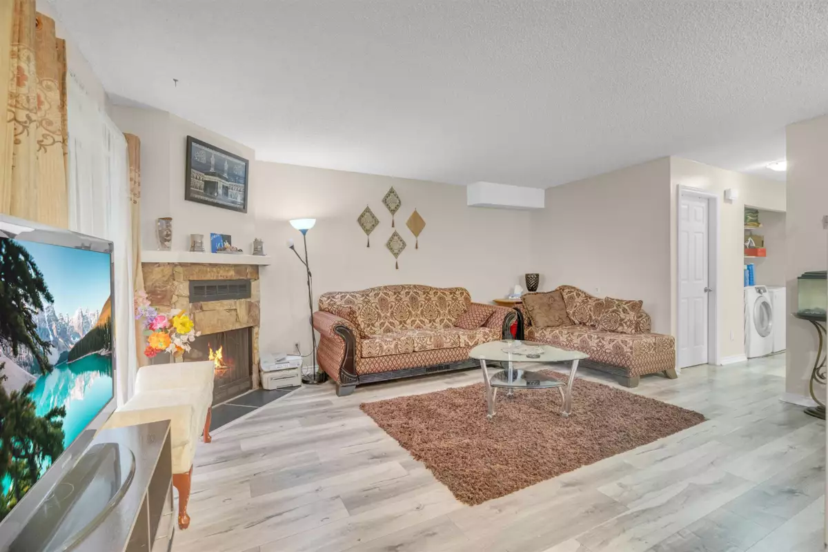 Family Room Photo of 102 7150 133 Street, Surrey, BC