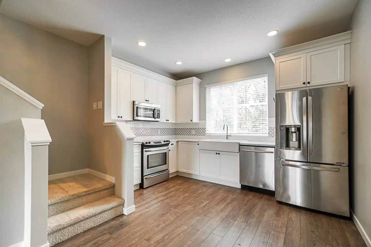 Living Room Photo of 9 19128 65 Avenue, Surrey, BC