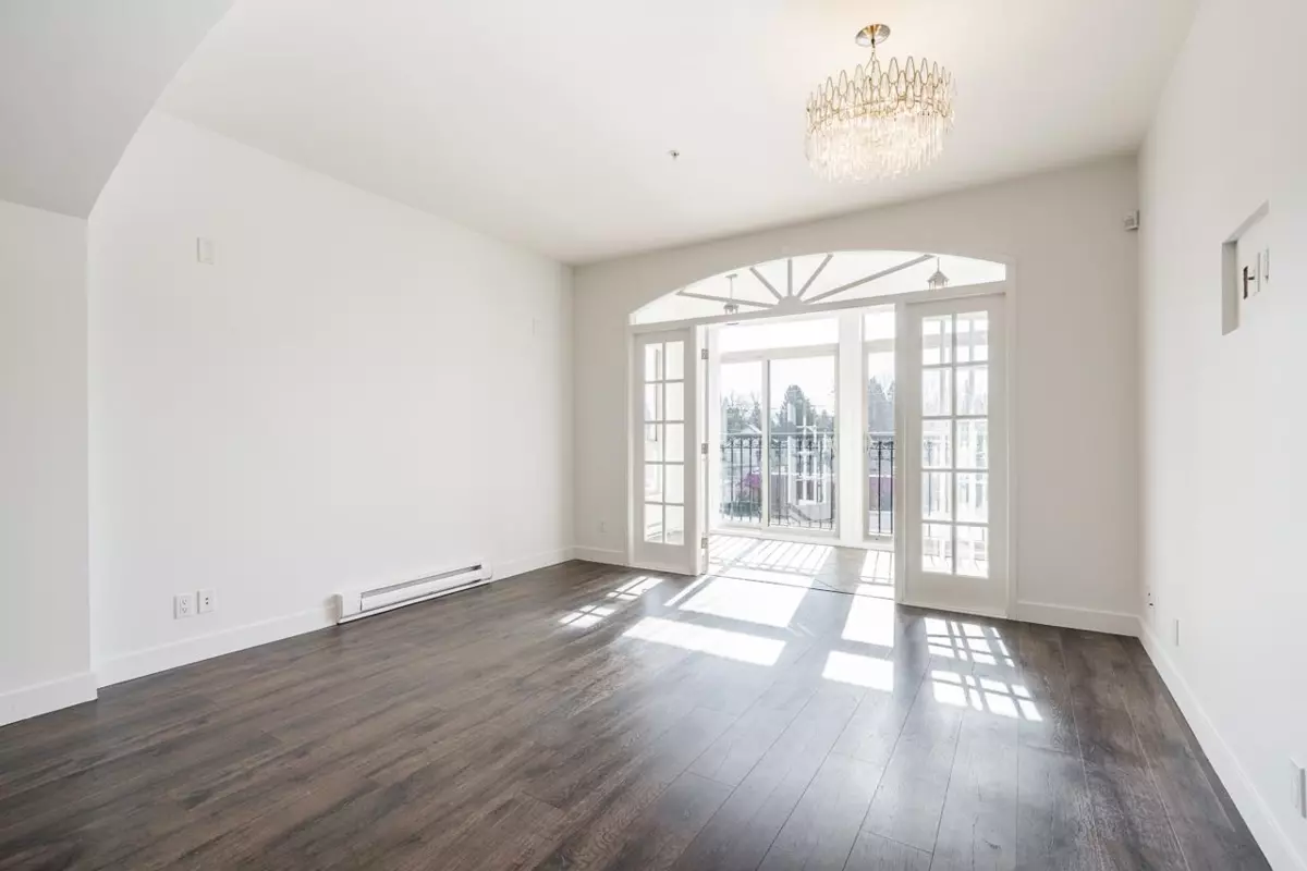 Living Room Photo of 211 33485 South Fraser Way, Abbotsford, BC