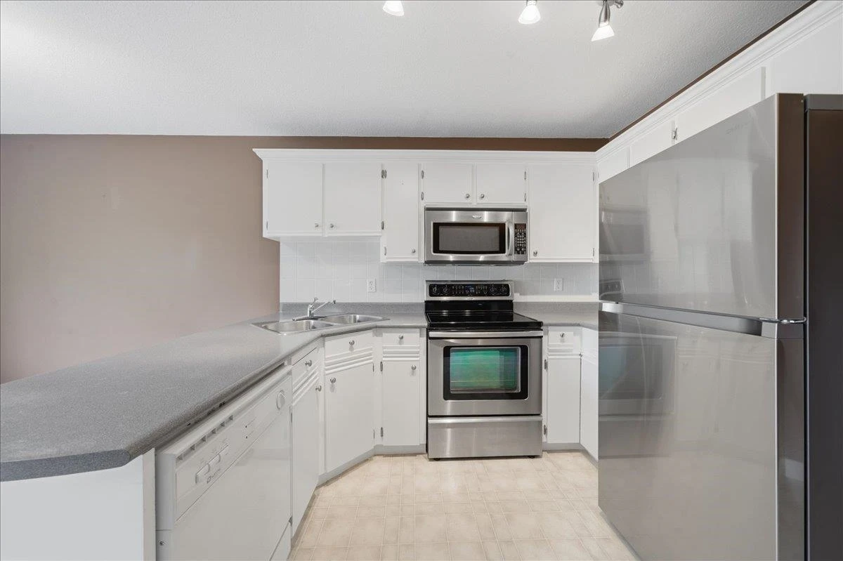 Family Room Photo of 411 450 Bromley Street, Coquitlam, BC