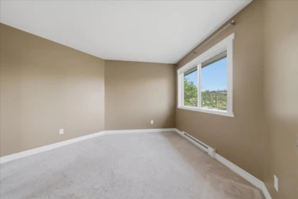 Garage Interior Photo of 411 450 Bromley Street, Coquitlam, BC