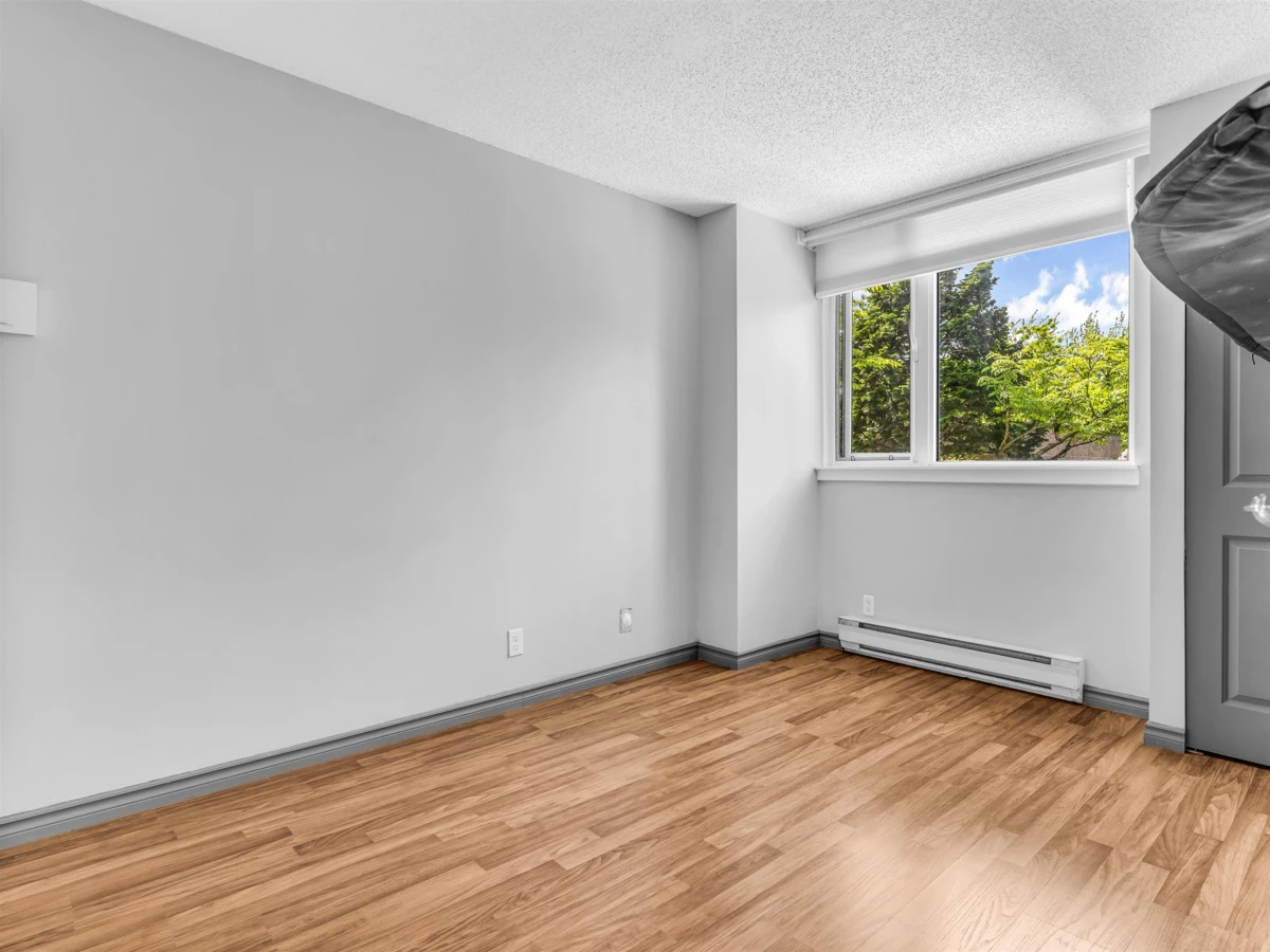 Family Room Photo of 202 3980 Carrigan Court, Burnaby, BC