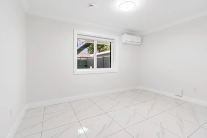 Basement Recreation Room Photo of 2 8464 15 Avenue, Burnaby, BC