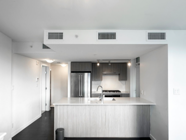 Laundry Room Photo of 304 7688 Alderbridge Way, Richmond, BC