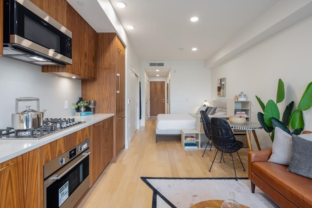 Family Room Photo of 410 2550 Garden Drive, Vancouver, BC