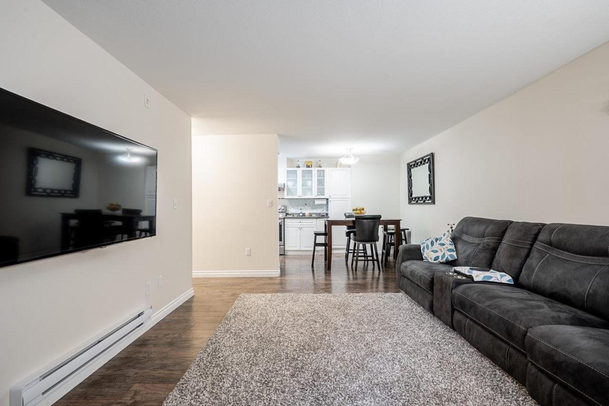 Living Room Photo of 106 1200 Pacific Street, Coquitlam, BC