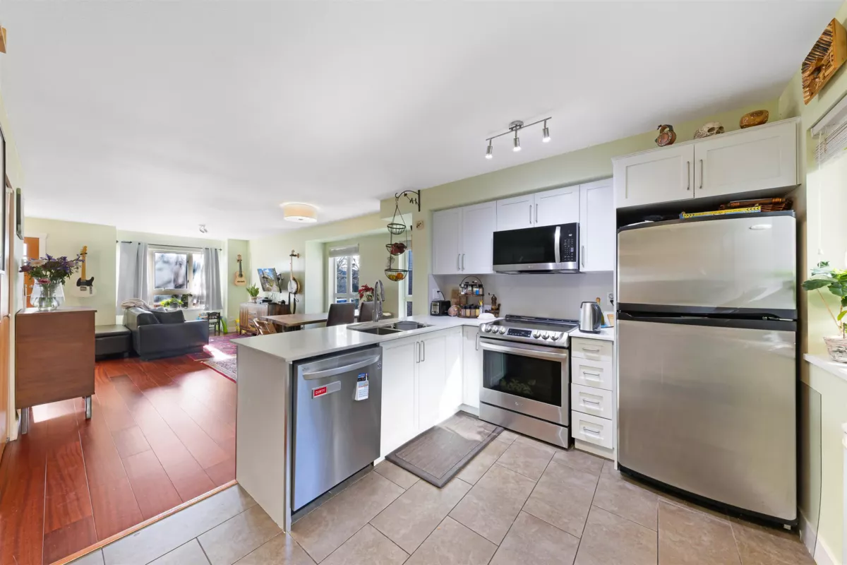 Living Room Photo of 10 4055 Pender Street, Burnaby, BC