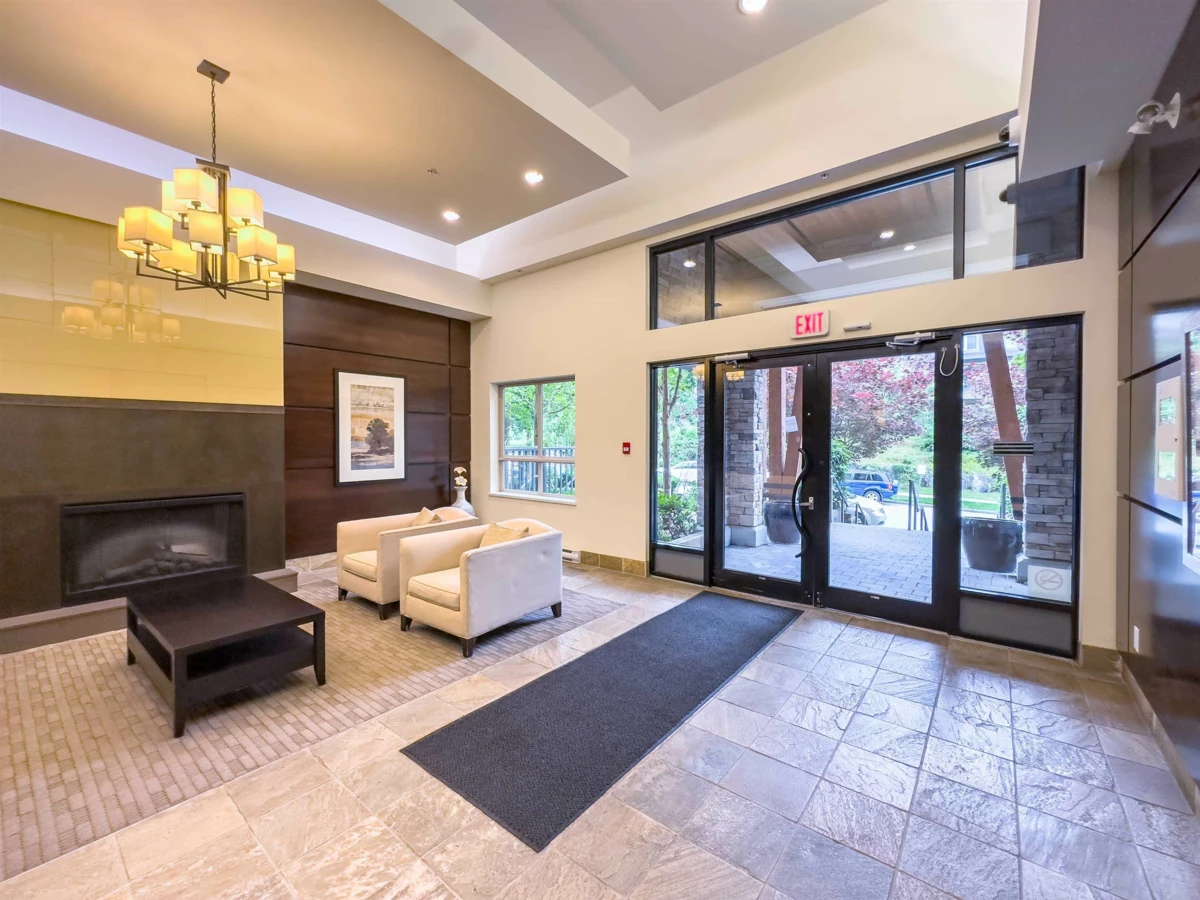 Living Room Photo of 307 3132 Dayanee Springs Boulevard, Coquitlam, BC