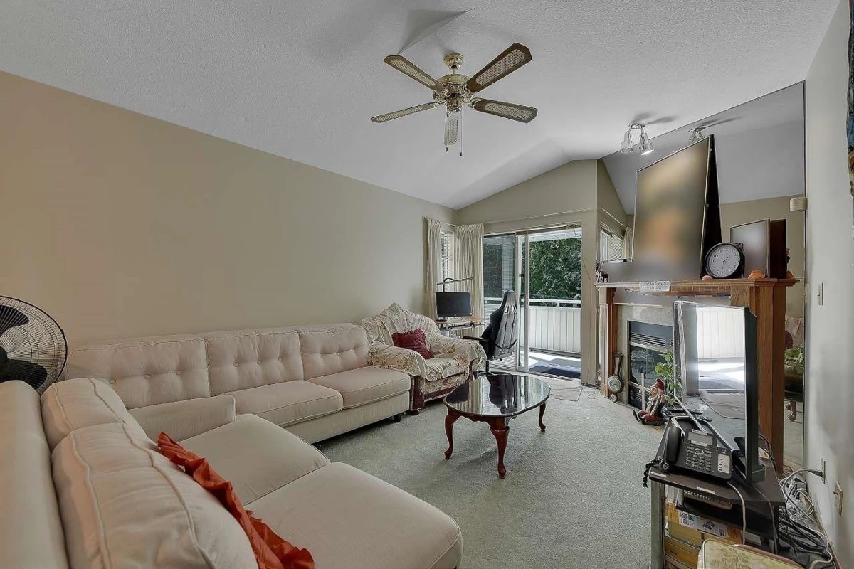 Living Room Photo of 204 7156 121 Street, Surrey, BC