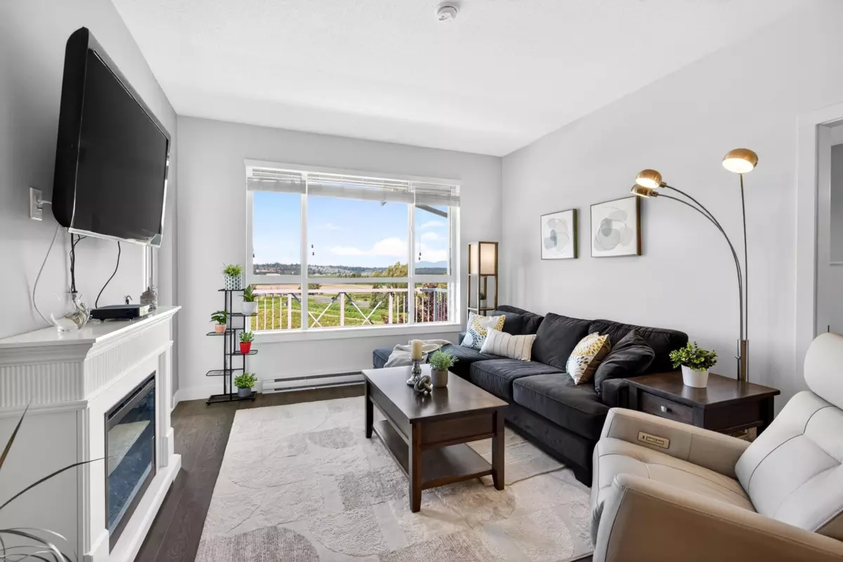 Living Room Photo of 406 16380 64 Avenue, Surrey, BC