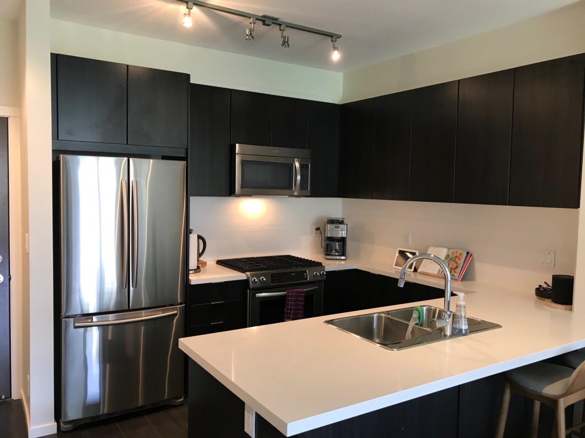 Living Room Photo of 213 3107 Windsor Gate, Coquitlam, BC