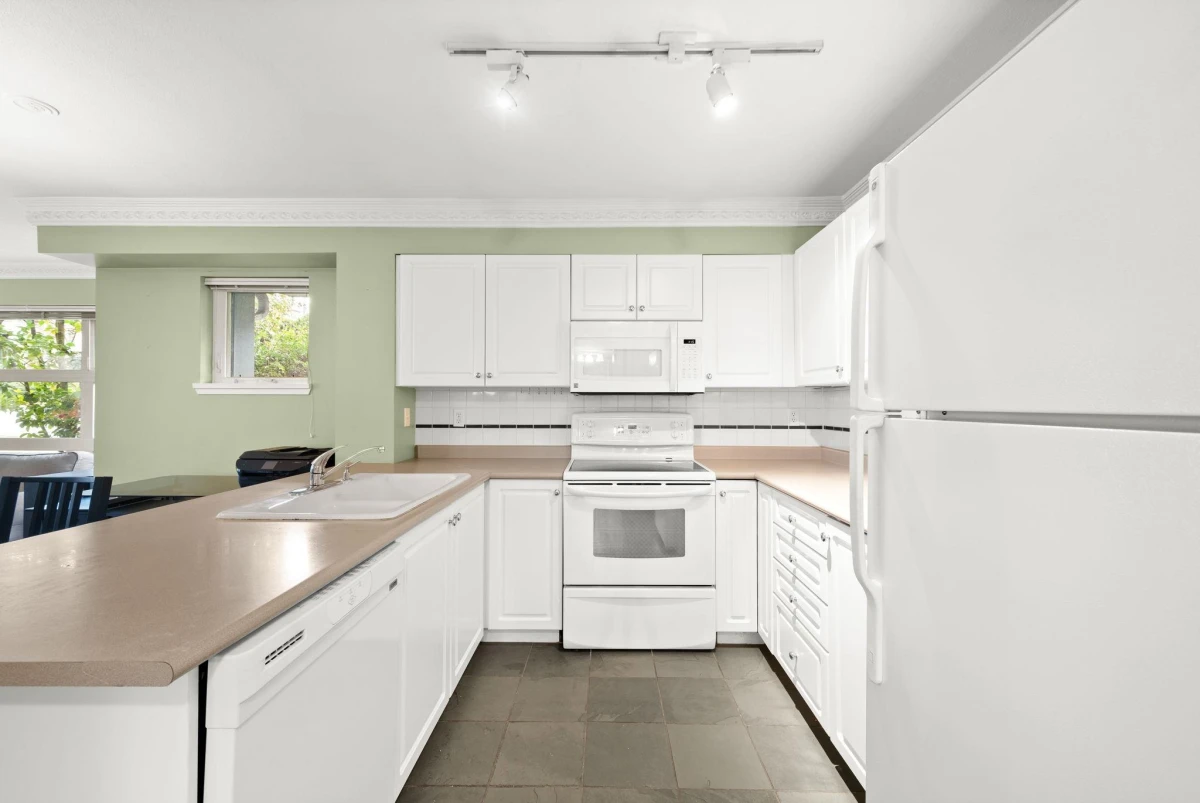 Family Room Photo of 104 2815 Yew Street, Vancouver, BC