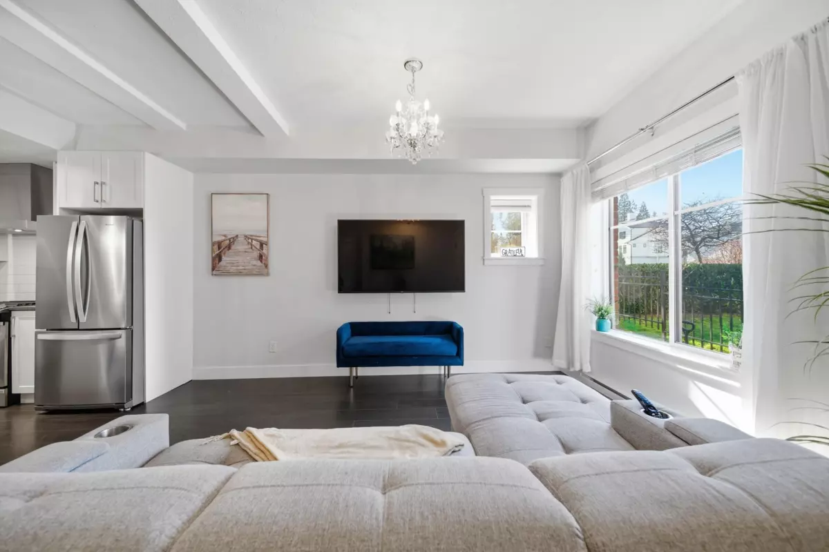 Living Room Photo of 104 16528 24a Avenue, Surrey, BC