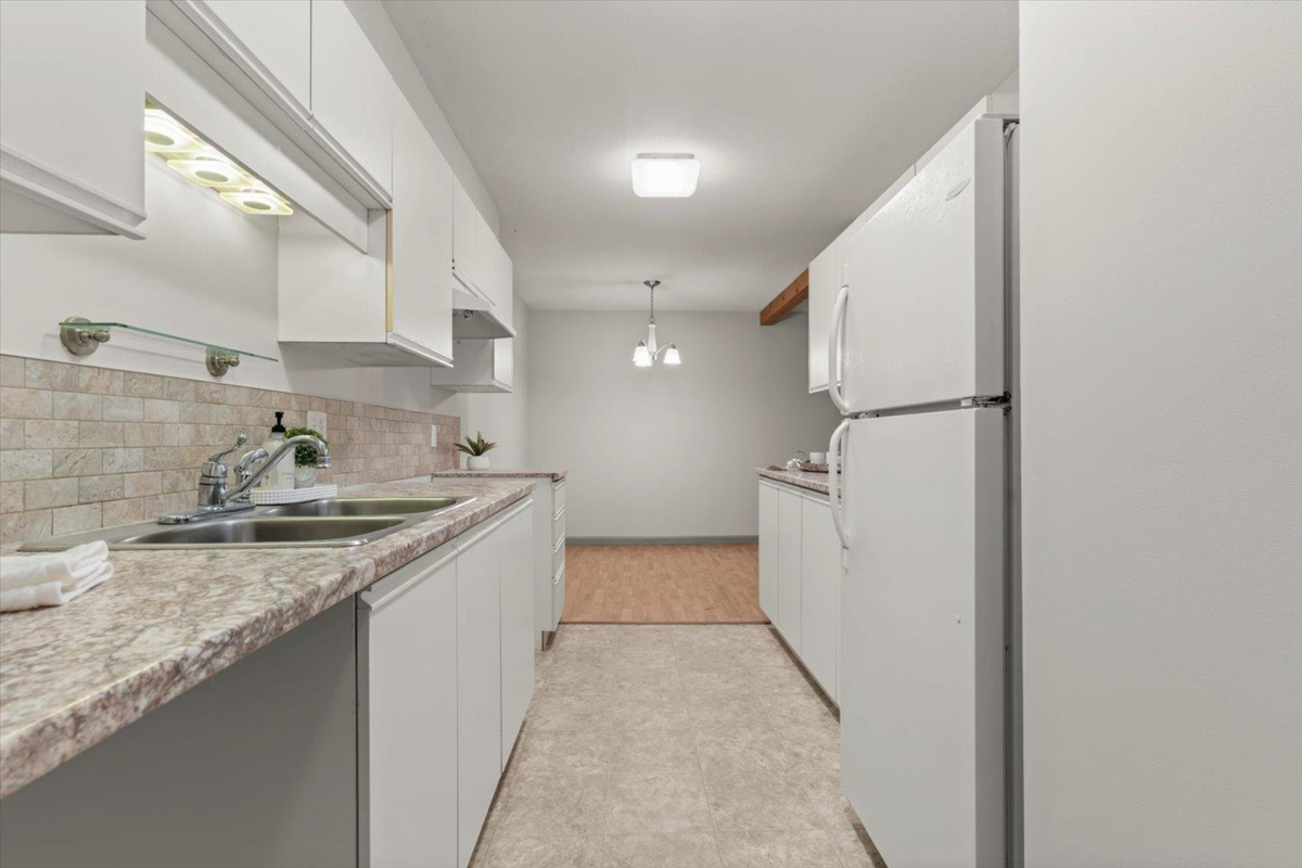 Garage Interior Photo of 106 7694 Evans Road, Chilliwack, BC