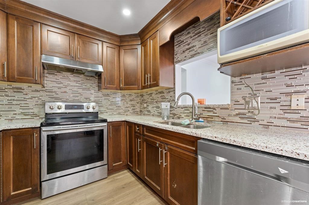 Exterior Rear Photo of 21 7140 132 Street, Surrey, BC