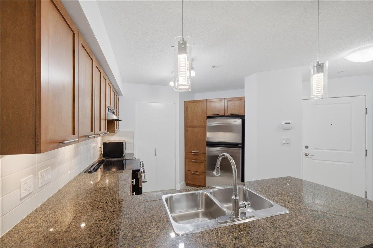 Dining Area Photo of 103 19673 Meadow Gardens Way, Pitt Meadows, BC