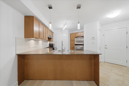 Kitchen Island Photo of 103 19673 Meadow Gardens Way, Pitt Meadows, BC