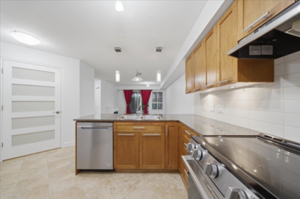 Kitchen Photo of 103 19673 Meadow Gardens Way, Pitt Meadows, BC