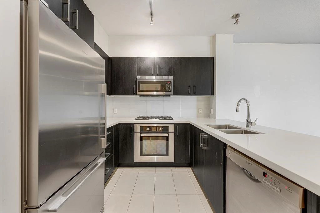 Family Room Photo of 422 3133 Riverwalk Avenue, Vancouver, BC