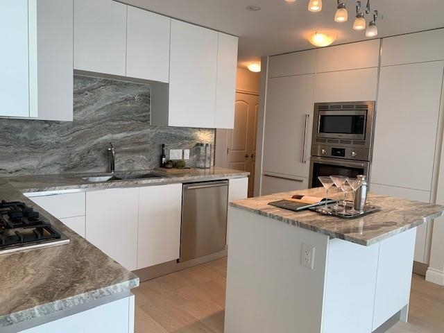 Family Room Photo of 904 175 Victory Ship Way, North Vancouver, BC