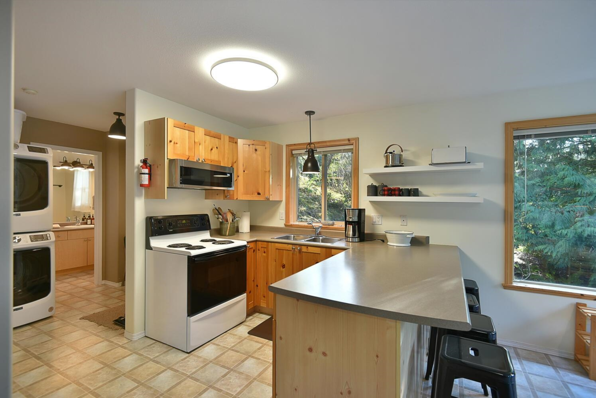 Family Room Photo of 8650 Redrooffs Road, Halfmoon Bay, BC