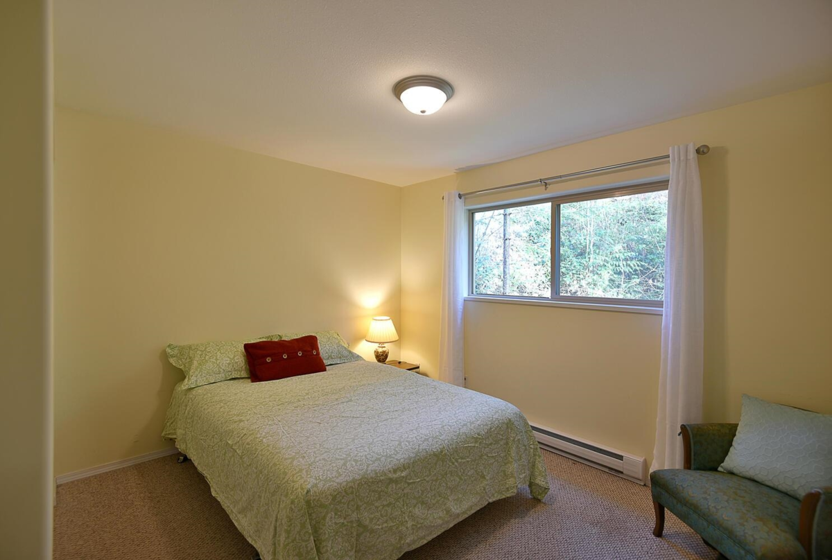 Primary Bedroom Photo of 8650 Redrooffs Road, Halfmoon Bay, BC