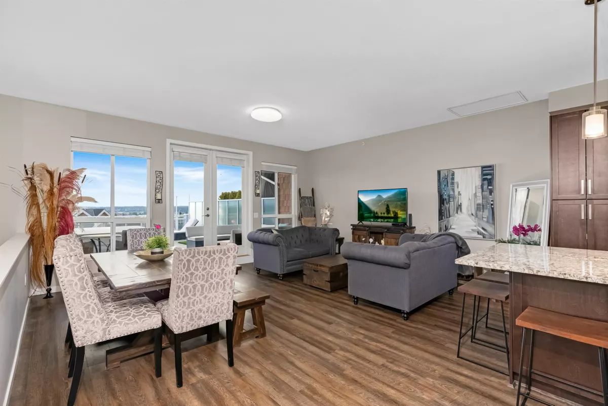 Living Room Photo of 410 6470 194 Street, Surrey, BC