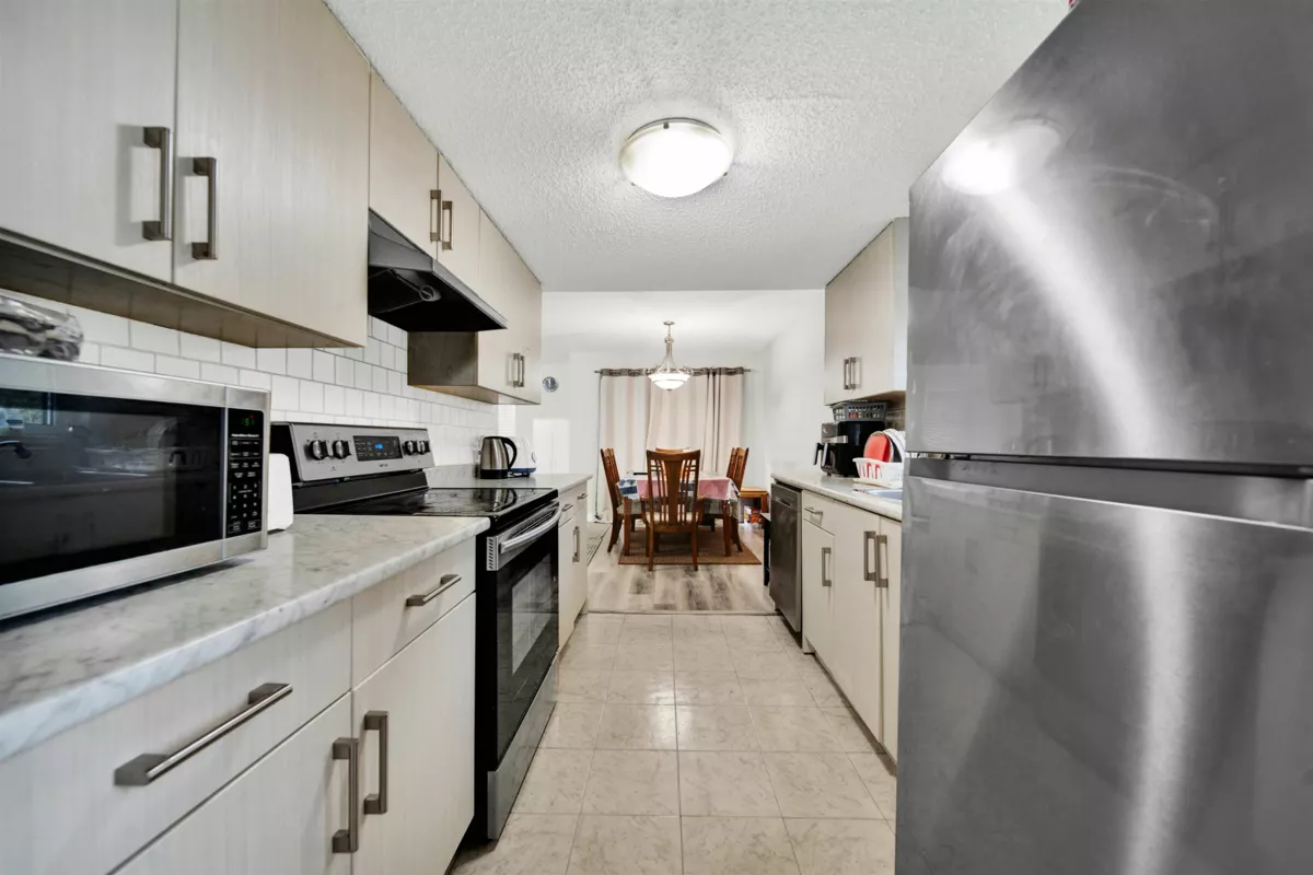 Living Room Photo of 104 13275 70b Avenue, Surrey, BC