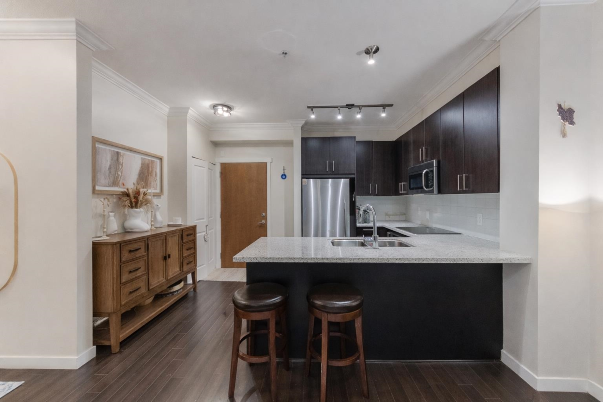 Family Room Photo of 217 119 W 22nd Street, North Vancouver, BC