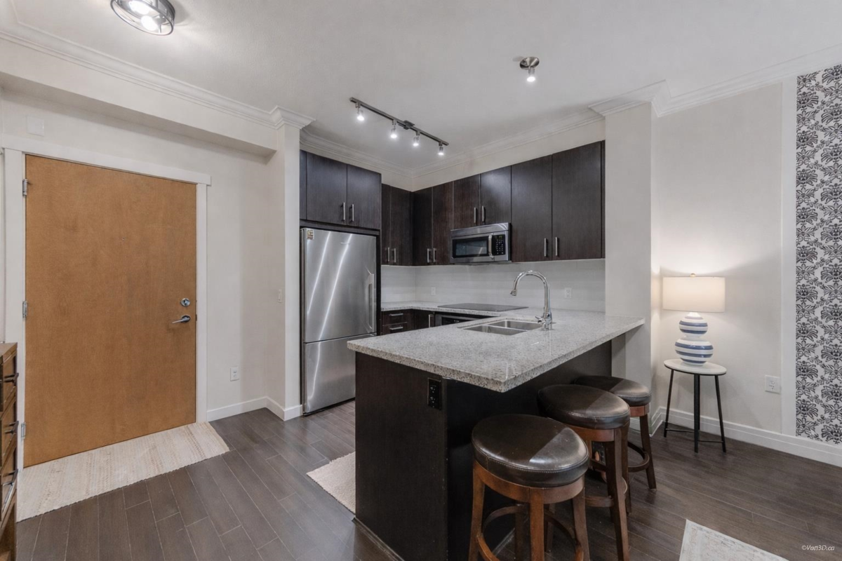 Living Room Photo of 217 119 W 22nd Street, North Vancouver, BC