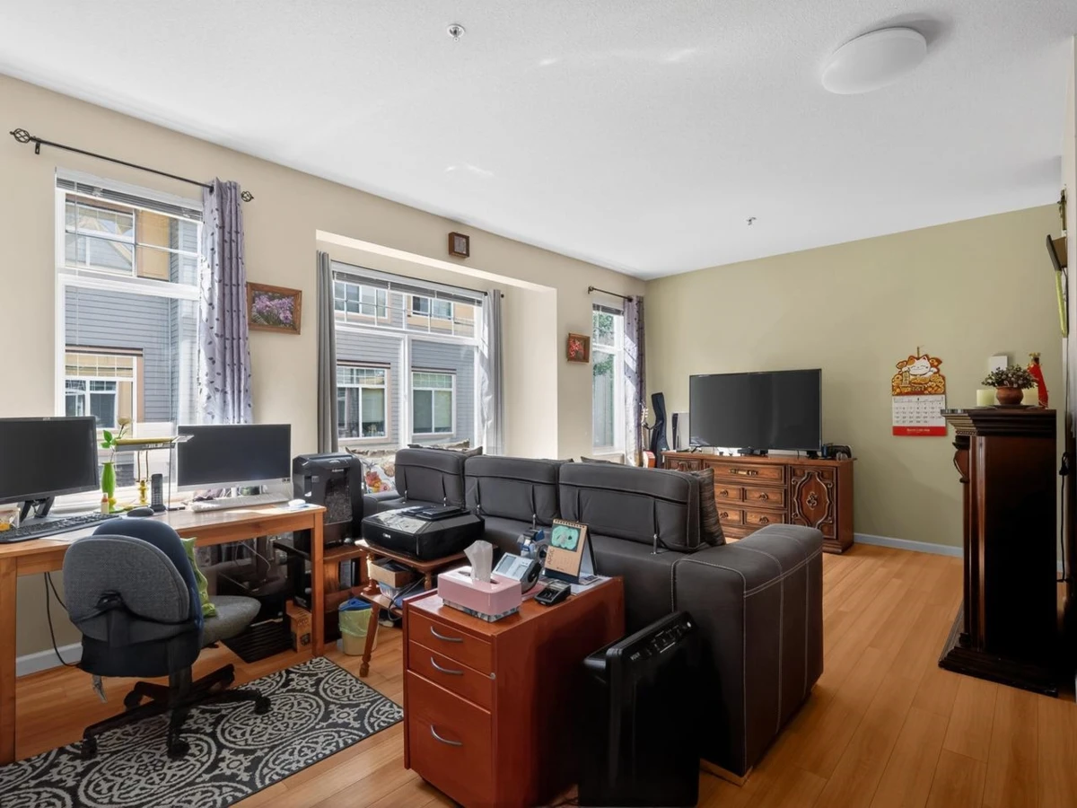 Living Room Photo of 2 15518 103a Avenue, Surrey, BC